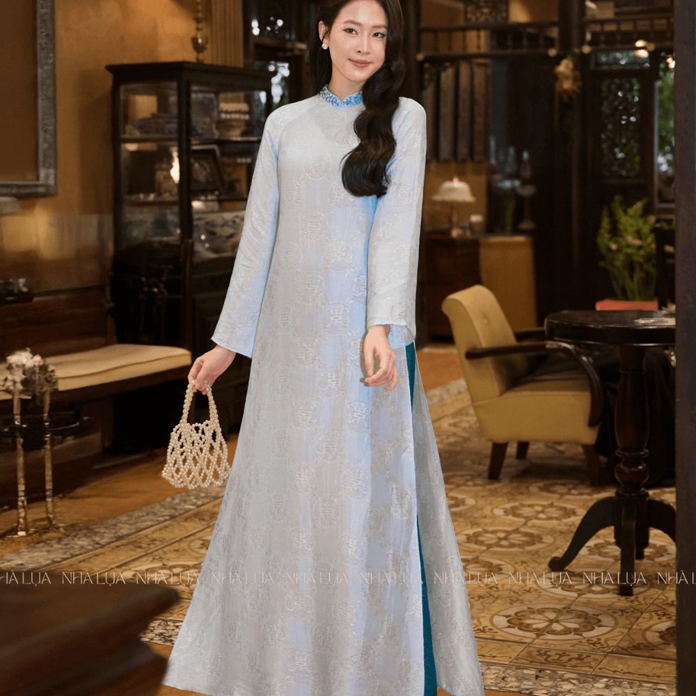 Áo Dài Thanh Khuê Đính Cườm Màu Xanh Nhạt Nhà Lụa