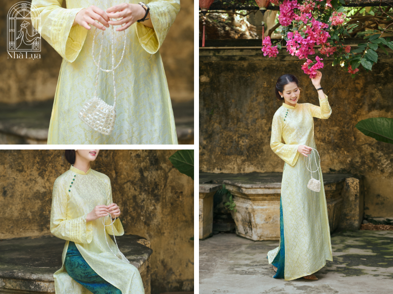 Tà áo dài lụa suông vàng nhạt, cài áo thêu tay nhỏ ở ngực, giỏ hạt trắng cầm tay, đứng dưới hoa giấy đỏ rực. Outfit du xuân nhẹ nhàng mà tinh tế, rất lên ảnh